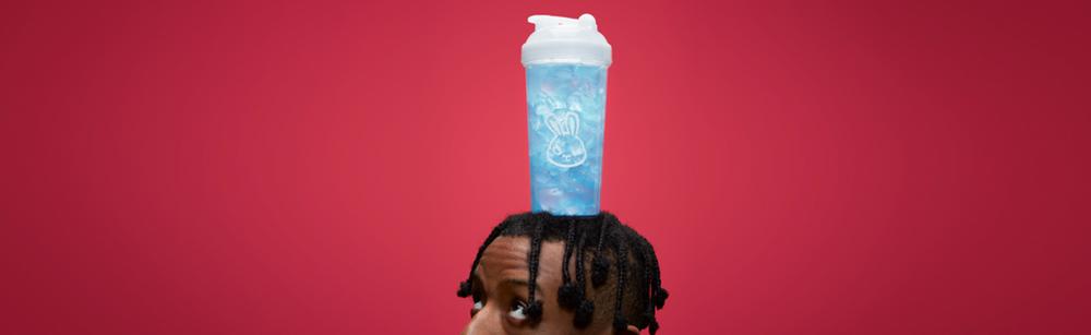 Sneak bottle on a man's head